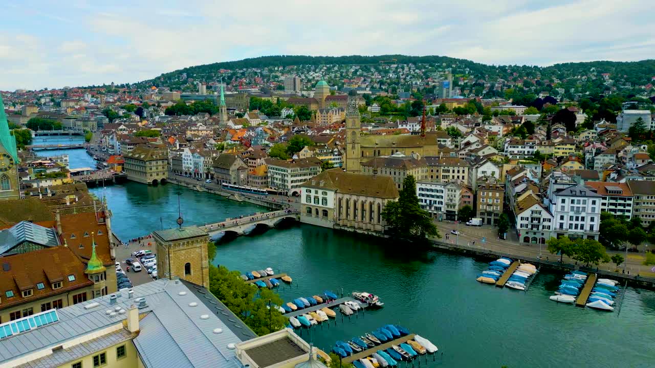 4K Drone Video of the Historic Buildings and Construction Cranes in Downtown Zurich, Switzerland