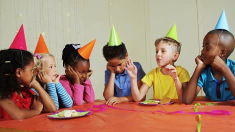 Boy-interacting-with-his-friends-during-birthday-party-4k