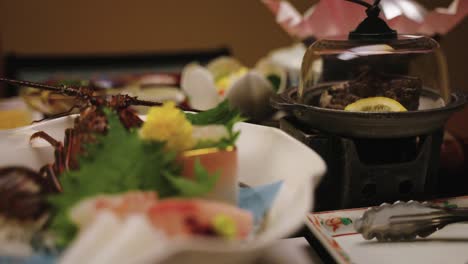 japanese sashimi, lobster and abalone in kaiseki meal