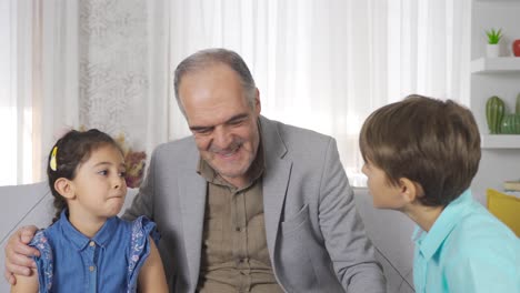 grandfather answers his grandchildren's questions.