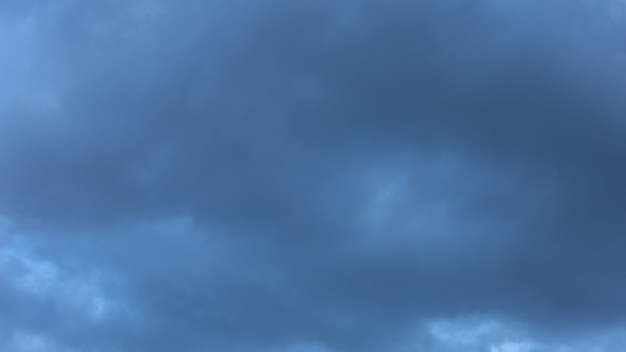 Blue clouds cover the Winter sky, at dusk