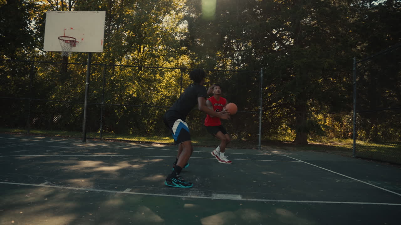 Basketball Game on Outdoor Court
