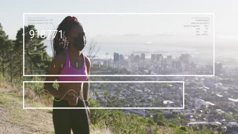 animation of changing numbers, graphs, african american woman jogging wearing mask