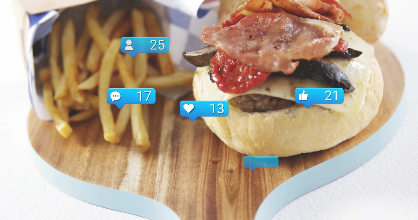 Burger and fries, one bubble appearing, badges grouping around food, counts updating for marketing