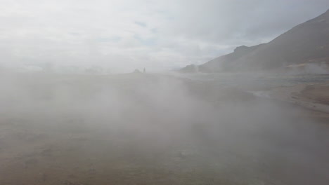 fantastic shot of the gases generated in the famous hverir geothermal field in which its fumaroles and mud lakes emanate gases