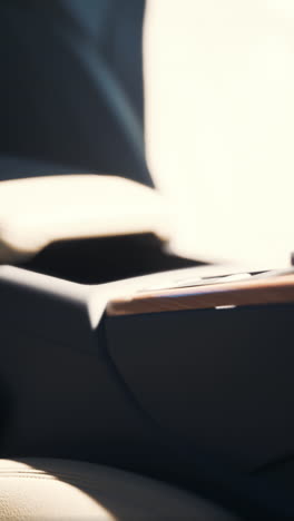 close-up of a car interior with leather seats and a center console