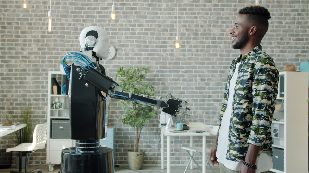 Robot and Man Shaking Hands in Modern Office