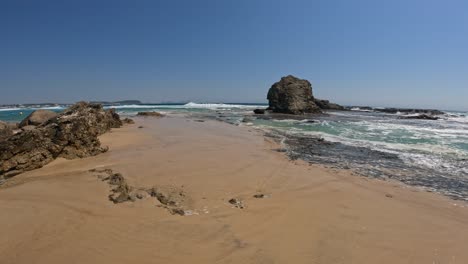 currumbin rock on sandy beach of currumbin alley in gold coast, queensland