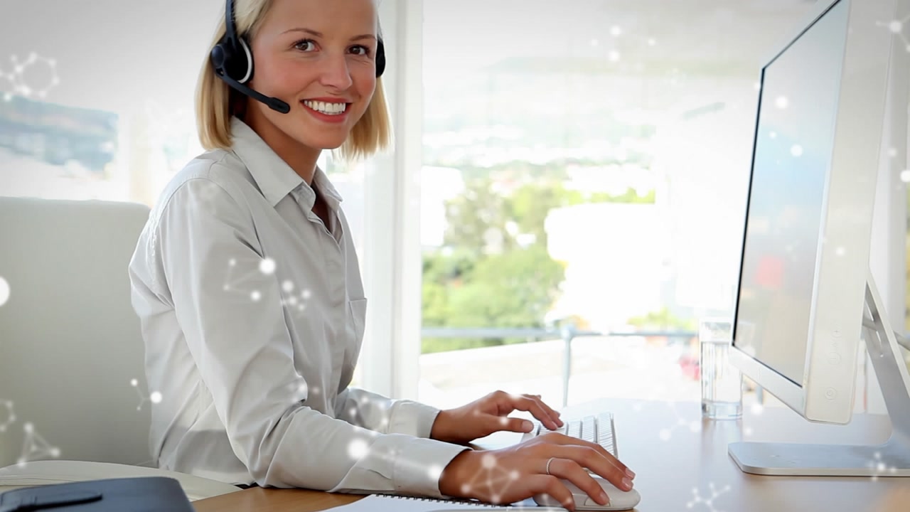 Animation of molecules over caucasian businesswoman using phone headset