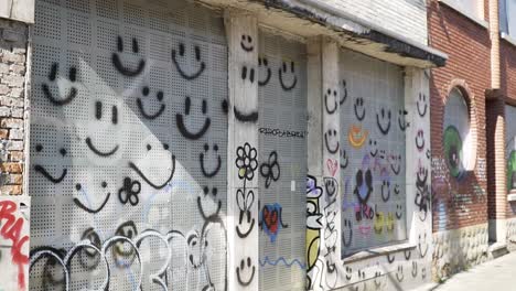 abandoned house with all graffiti smileys on the walls