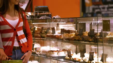 couple selecting desserts