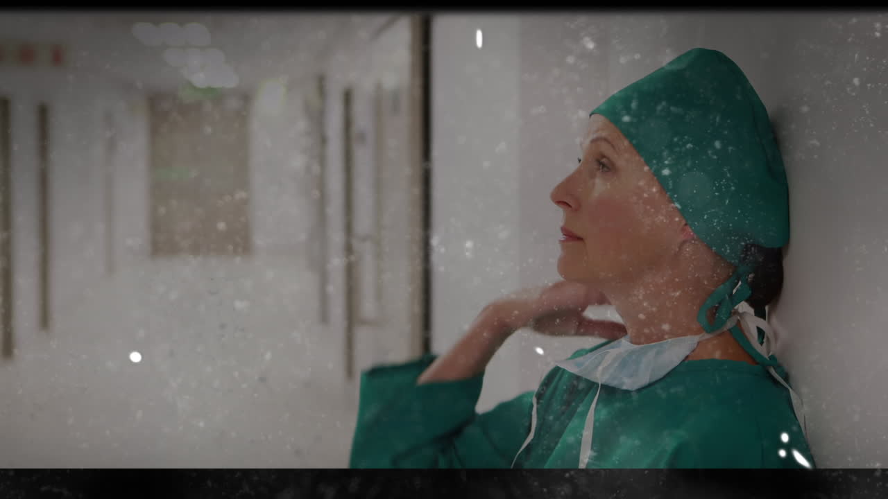 Animation of interference over sad caucasian female nurse