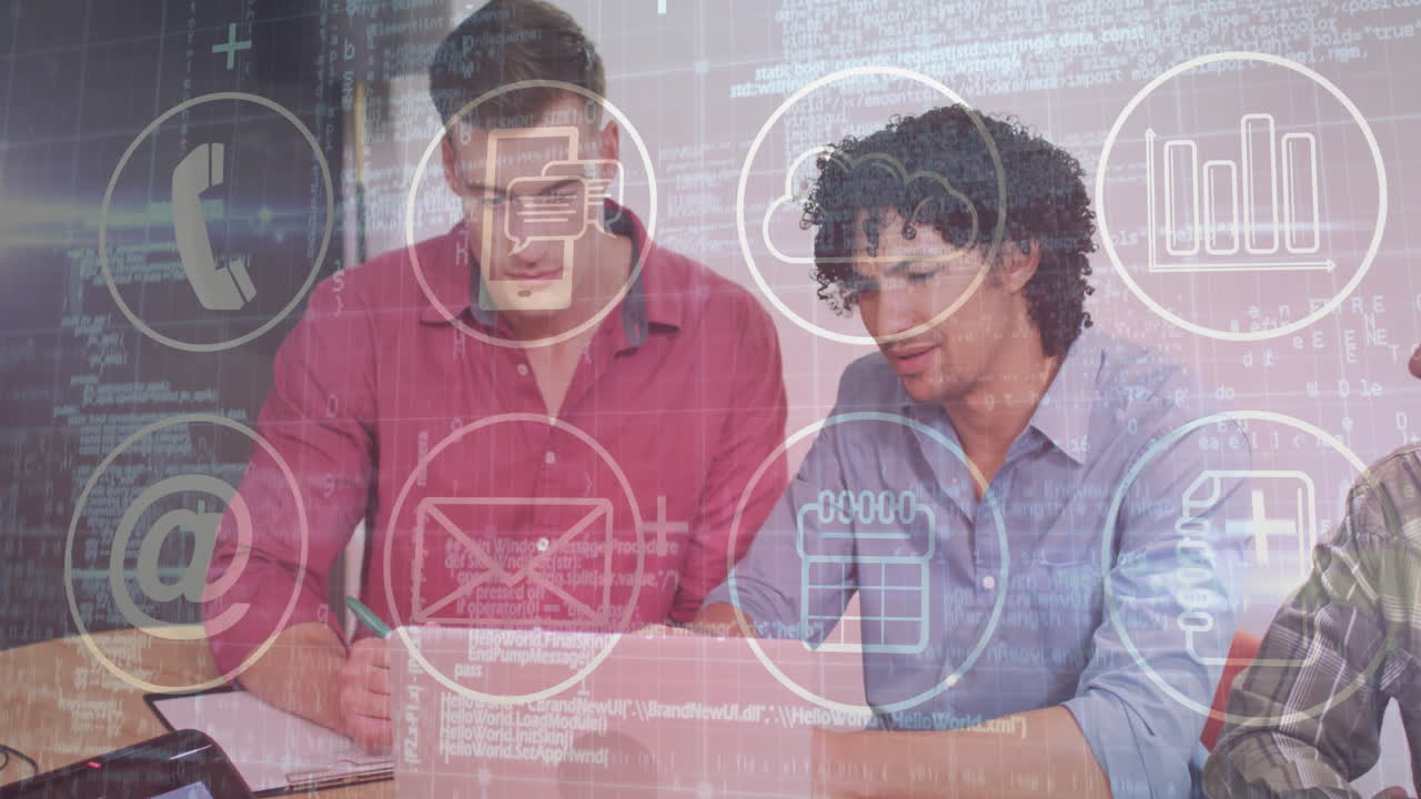 Working on laptop, two people using animation with digital communication icons