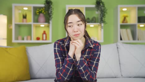 depressed woman at home thoughtful.