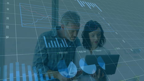 analyzing financial data on laptop, business people with charts animation over them