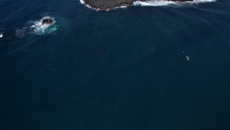 flying towards cook island in new south wales, australia - drone shot