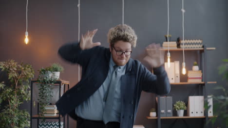man dancing in office
