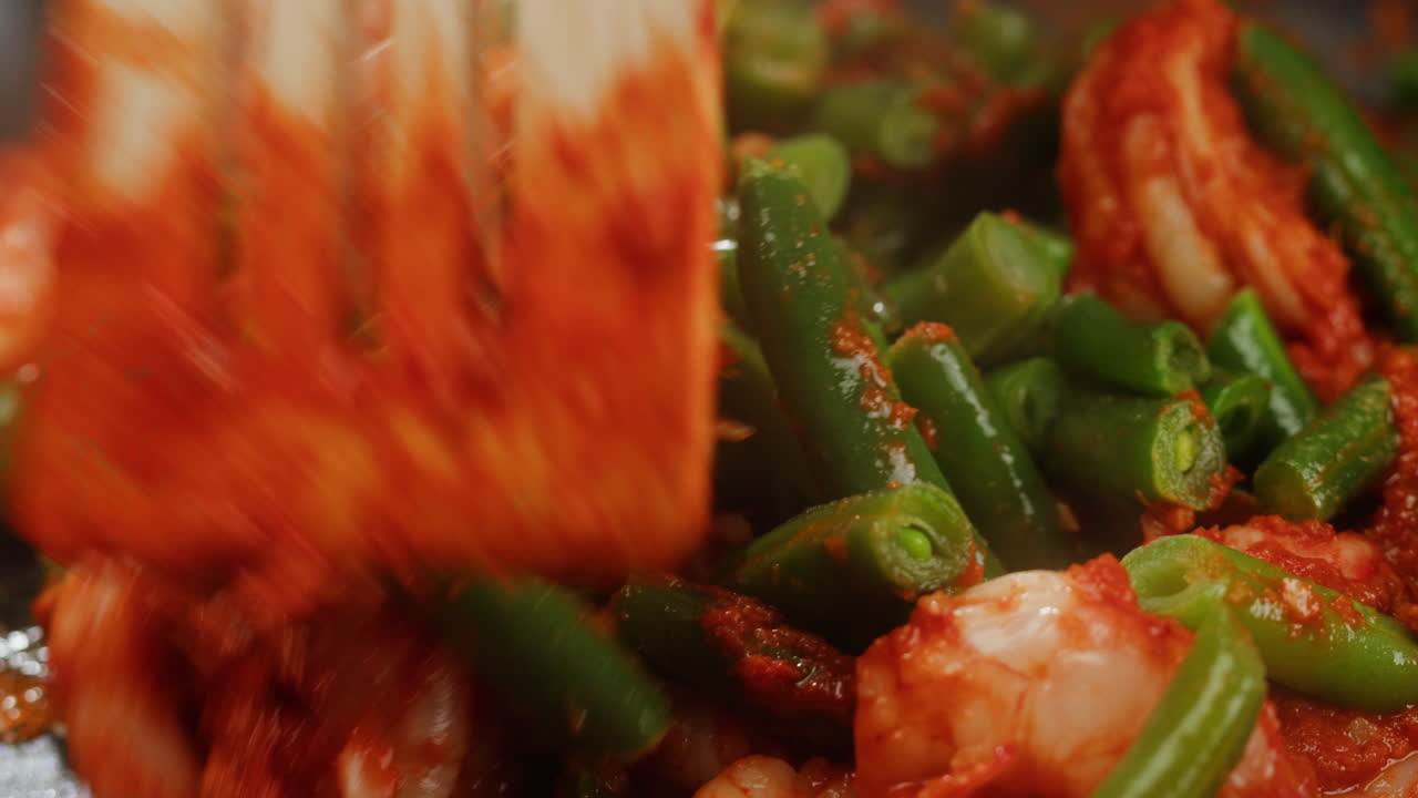 Stir-fried green peas with shrimp on a white plate. High quality 4k footage