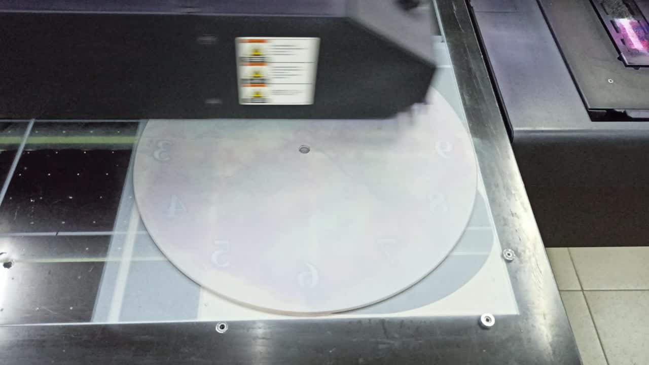 Ultra violet printer at work. Printing photos. Modern technology in action