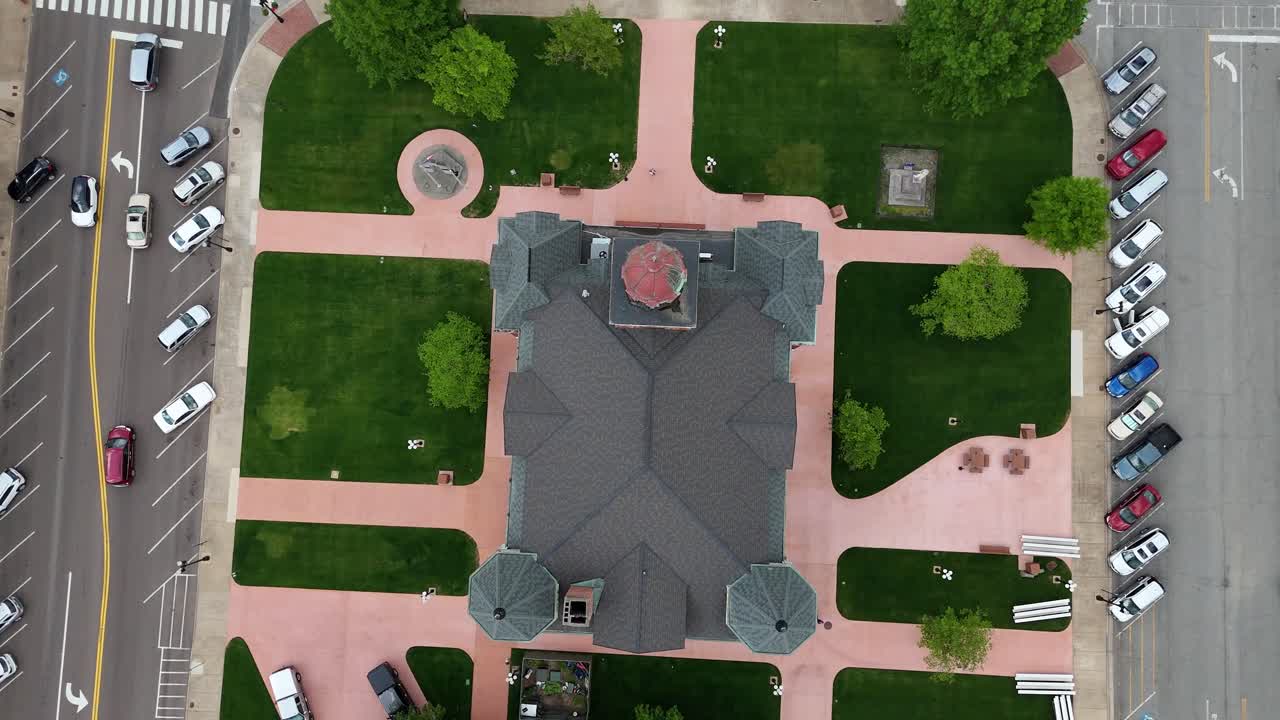 Descending aerial shot of the courthouse located in downtown Paris Tennessee