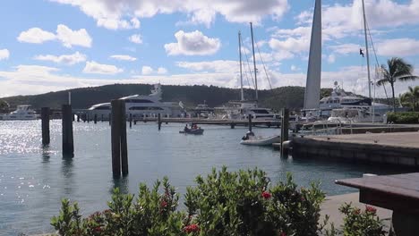 Caribbean-island-port-with-boats-and-dingy-coming-into-docks