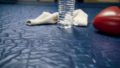boxing equipment on a blue tarp