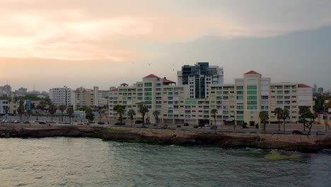 coastal city at sunset