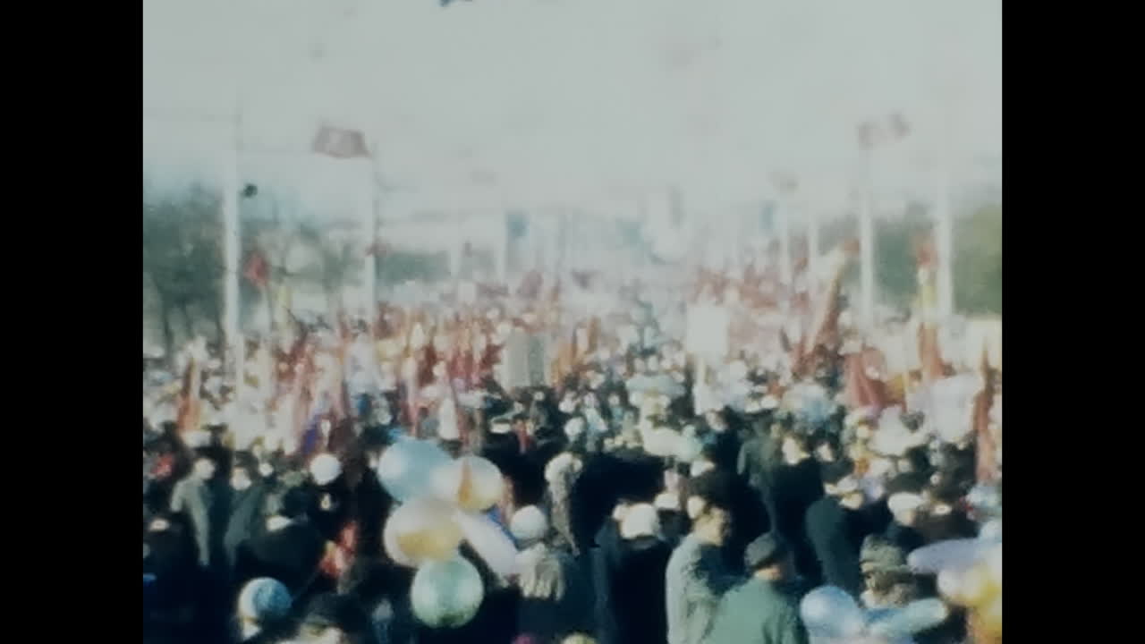 Crowd of People Gathered in Soviet Union Archive. CIRCA USSR 1970: A gathering of people in a crowd, showcasing the spirit of the Soviet Union during the era of communism and socialism.