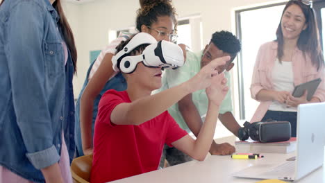 diverse students engage in a vr experience at high school