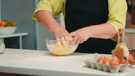 chef mixing bread ingredients