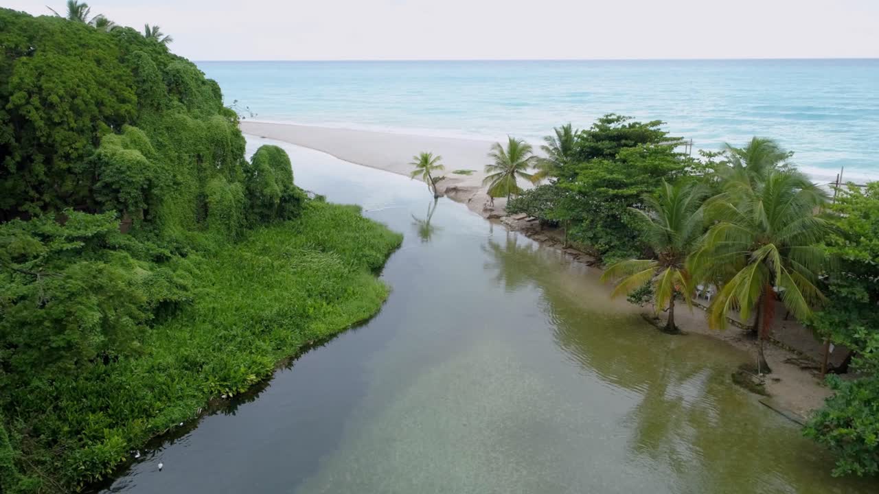 Aerial view of Rio Los Patos, World's shortest river. Dominican Republic