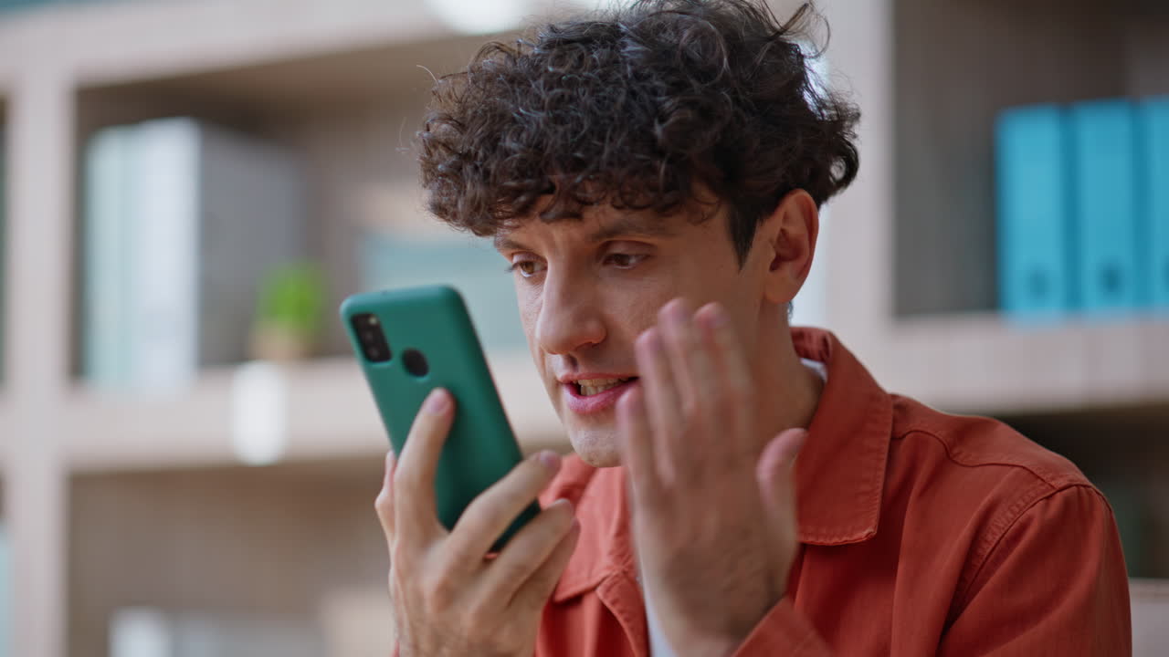 Furious boss shouting cellphone dissatisfied crisis closeup. Angry businessman