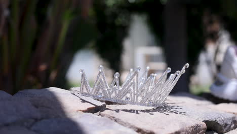 silver bridal crown for the bride's wedding in the garden - camera moving down