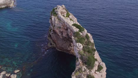 Mirador-de-Es-Pontàs-Mallorca-natural-arch-during-day-time,-aerial