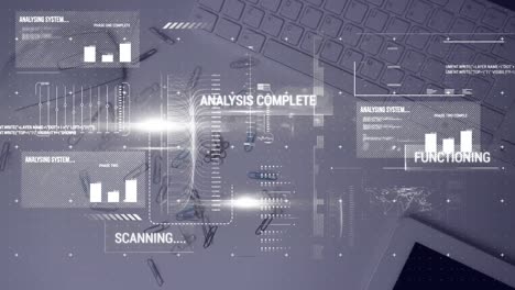 animating of interface with data processing against paper clips falling on office table