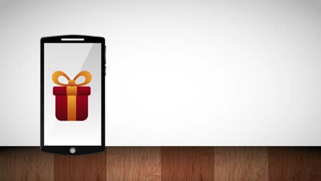 caja de regalo de teléfono inteligente y bolsa de compras en la pantalla en línea