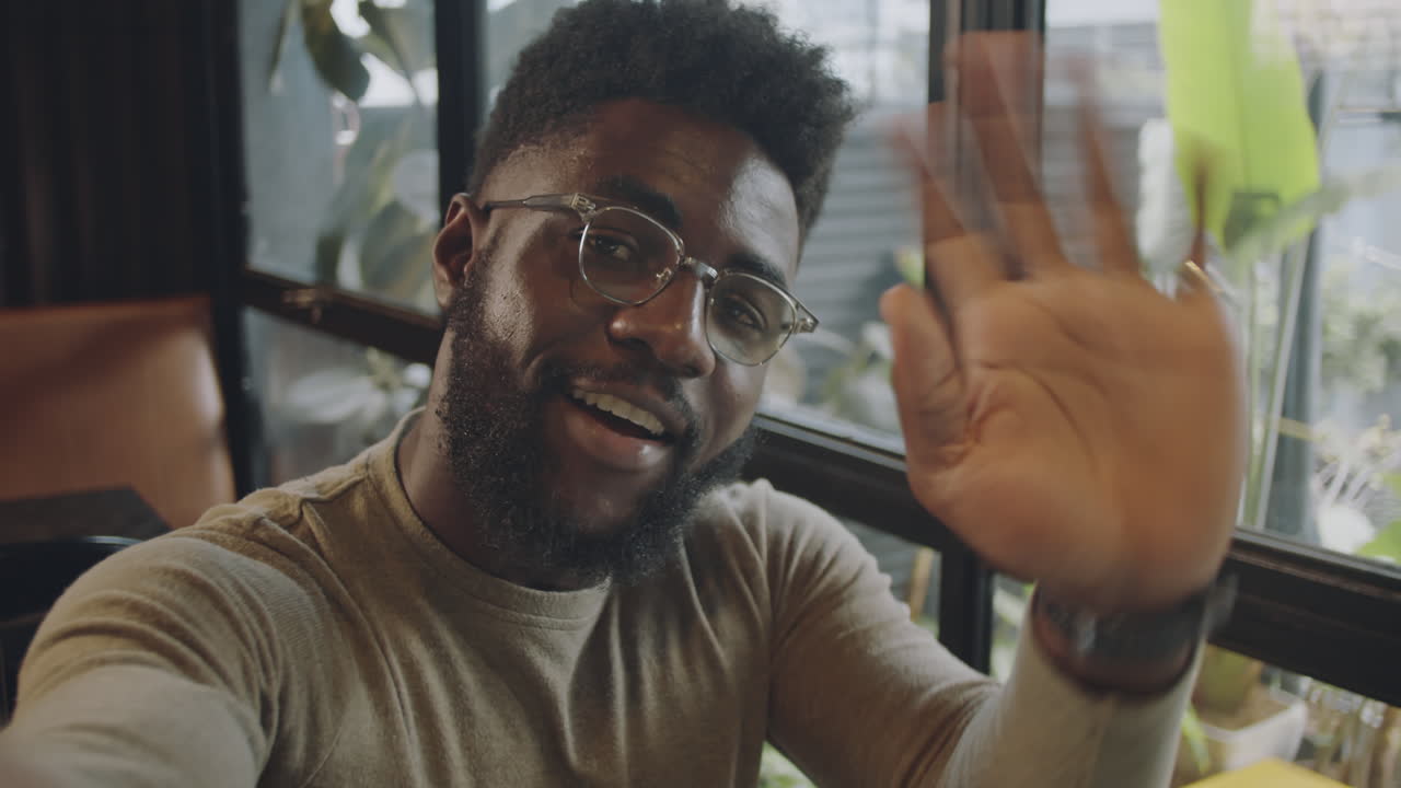 A man taking a selfie indoors