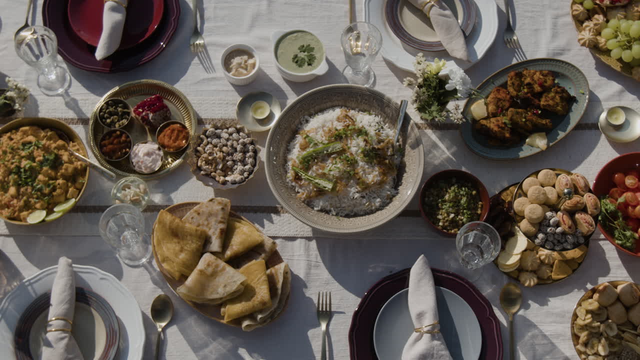 Overhead View of a Beautiful Indian Food Spread on an Outdoor Dining Table
