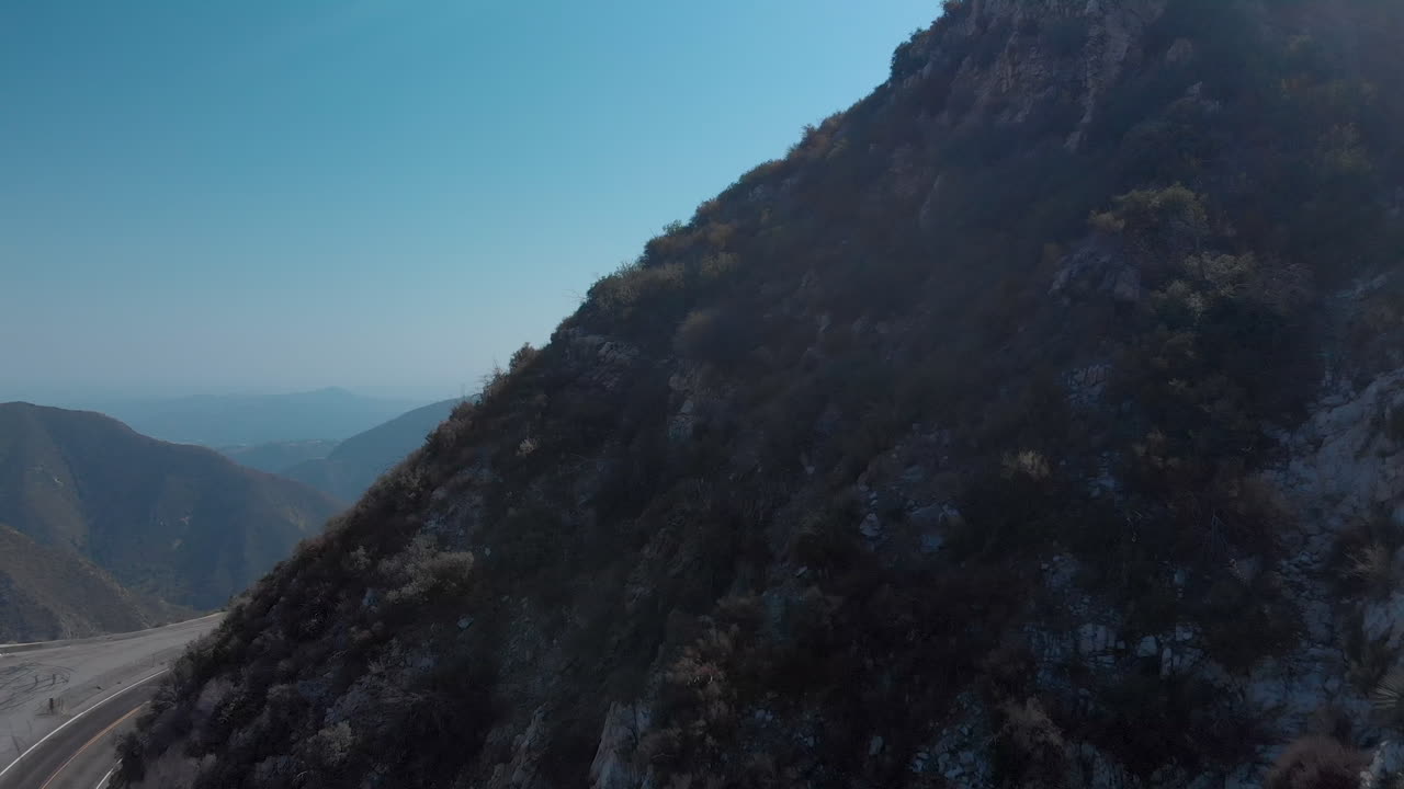 Aerial View of Mountain Road and Landscape