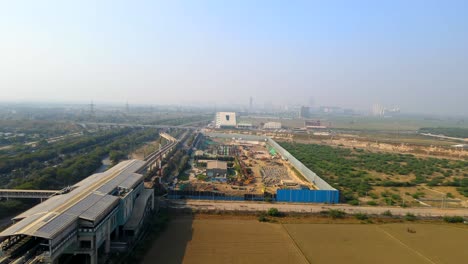 aerial drone shot capturing a massive construction site in noida india