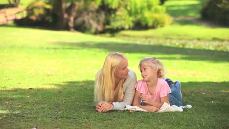 young woman talking with her daughter