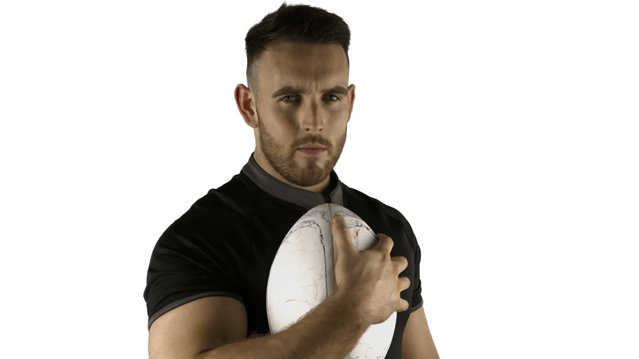 Poważny rugbysta z piłką