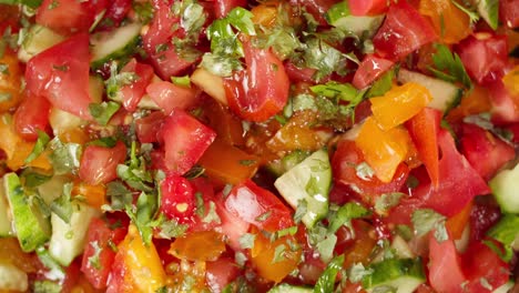 vegetable salad, vegetarian food. middle eastern culture. moroccan cuisine top view. cold appetizer concept. cucumbers, tomatoes, pepper with oil and greenery.