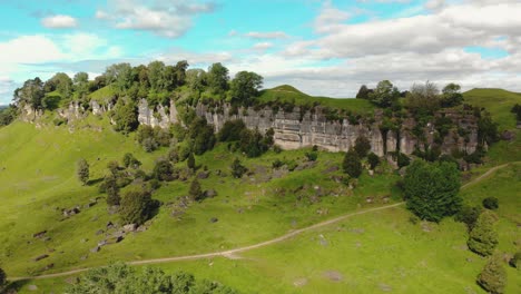 aerial park south new zeland rock crest formation with little path for hike trekking in a remote unpolluted area for new normal holiday