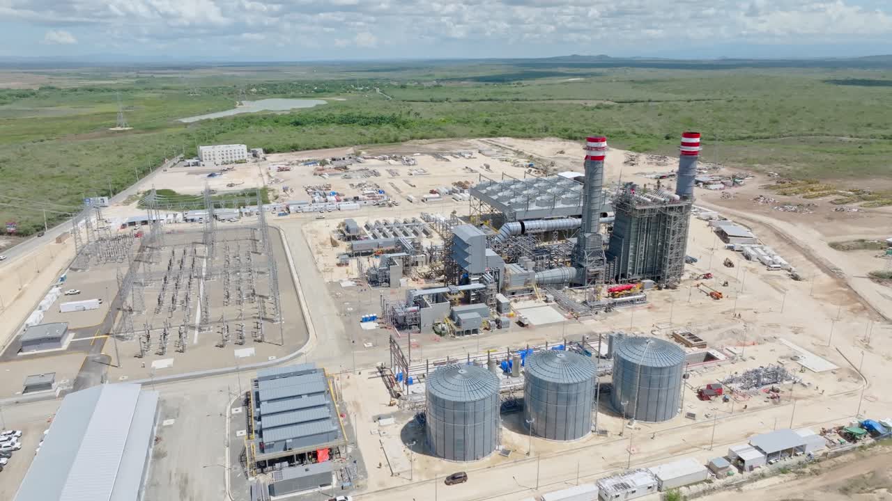 Energy 2000 Energy generation plant in rural suburbia of town. Manzanillo, Dominican Republic. Aerial wide shot
