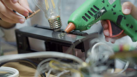 Closeup-shot-of-two-children-doing-school-project-in-engineering