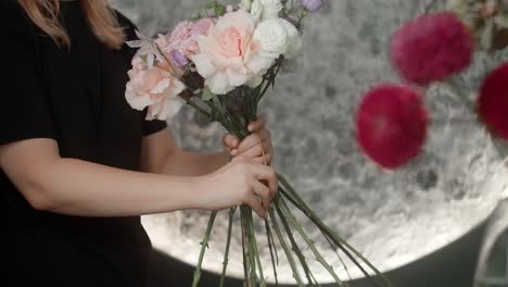 floral arrangement by a woman