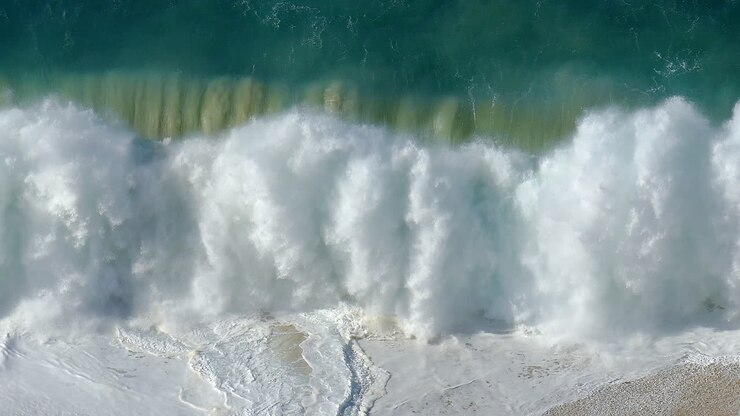 Footage of a large wave violently crashing on the shore in Cabo San Lucas, Mexico