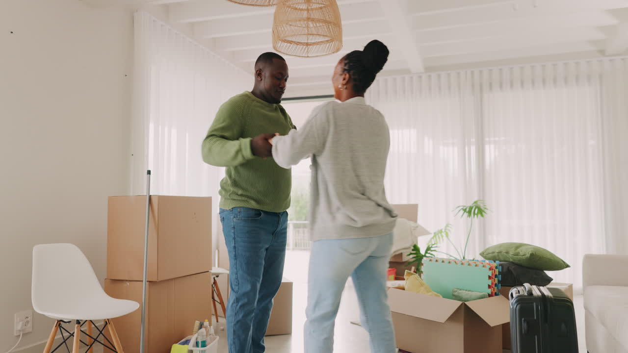 Black couple, moving in and celebrate at home