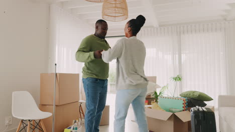 Black-couple,-moving-in-and-celebrate-at-home